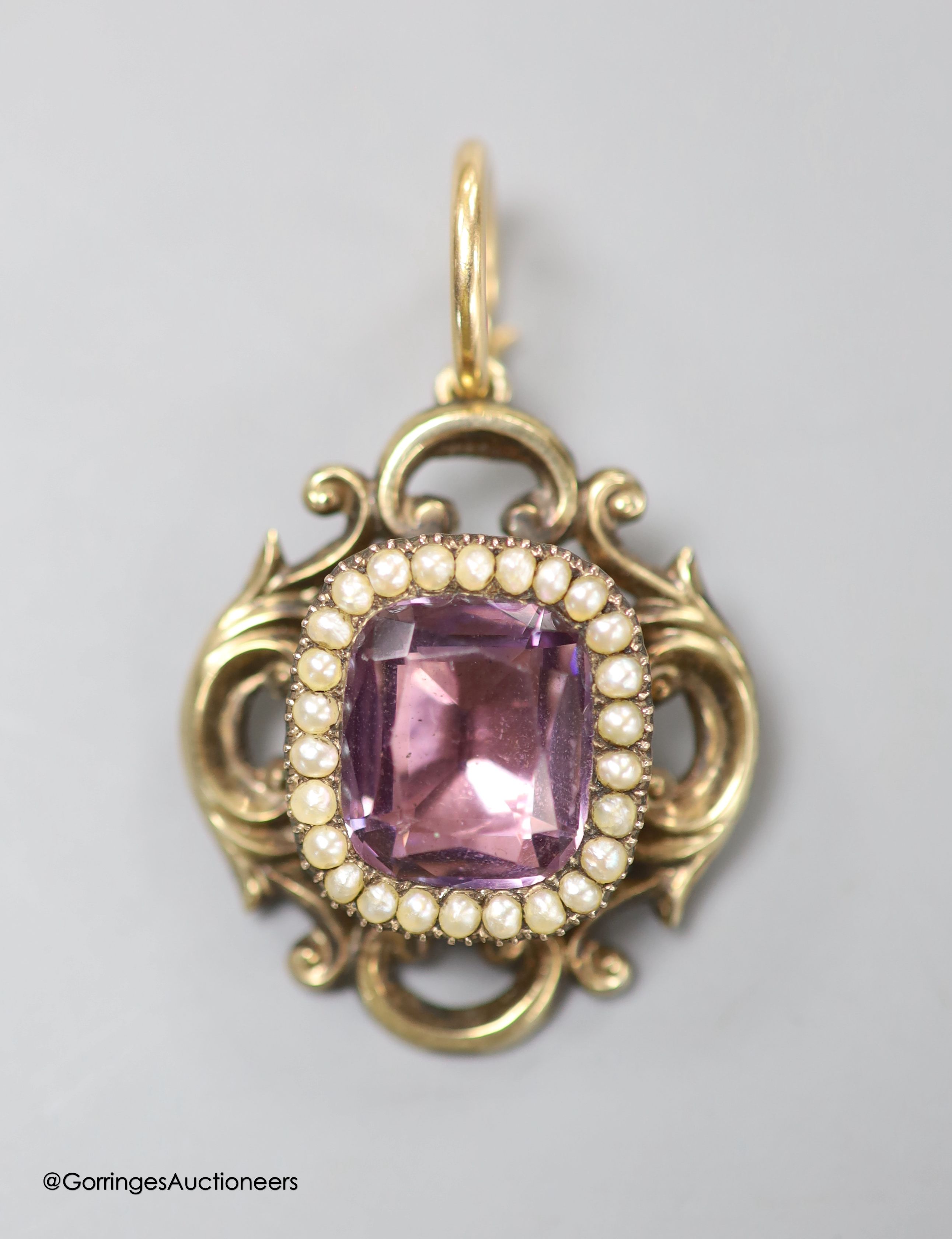 A late Victorian yellow metal foil backed? paste and seed pearl set pendant, 31mm, gross weight 8.5 grams.